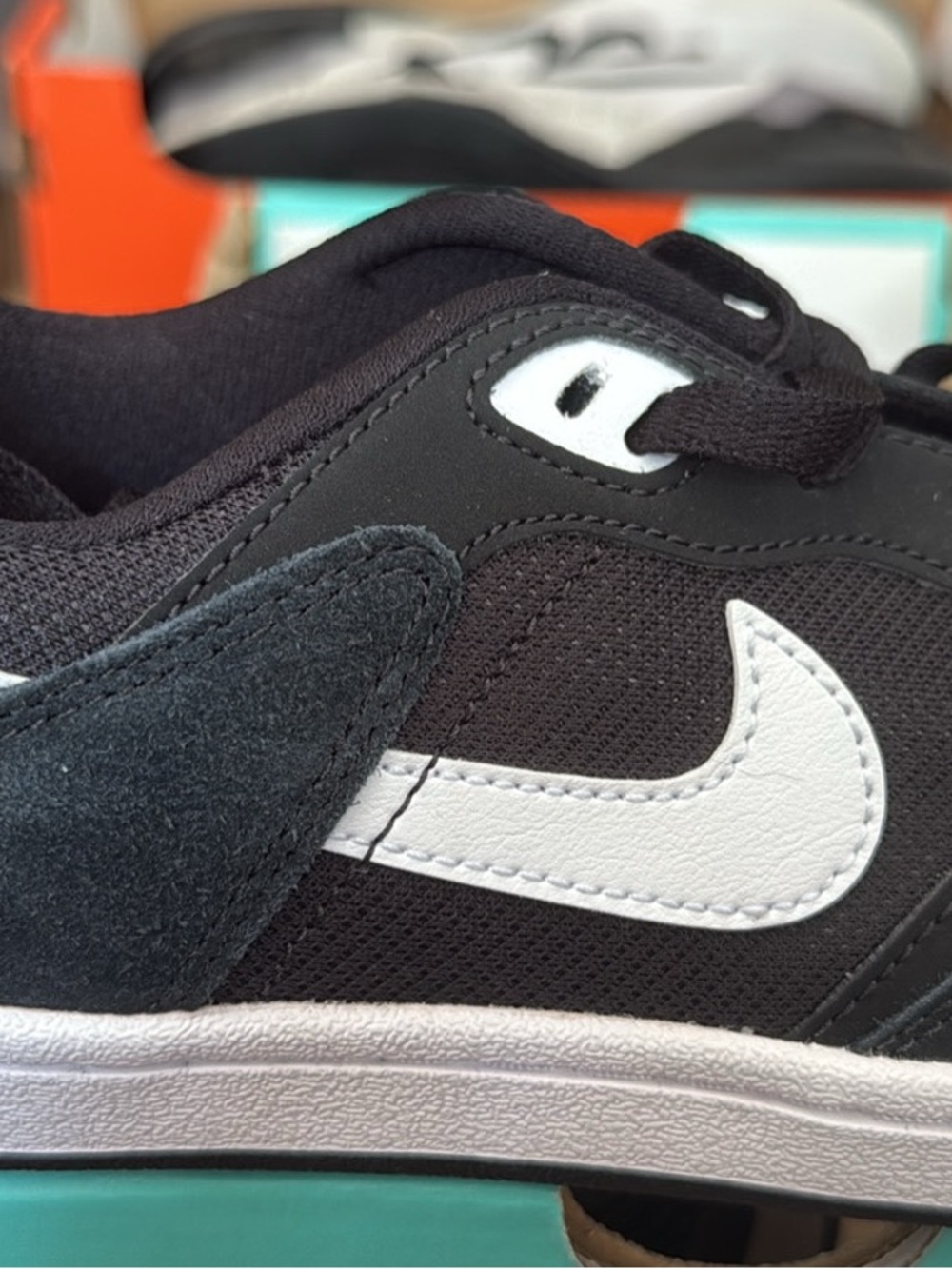 Nike Kids Black Sneakers with White Swoosh